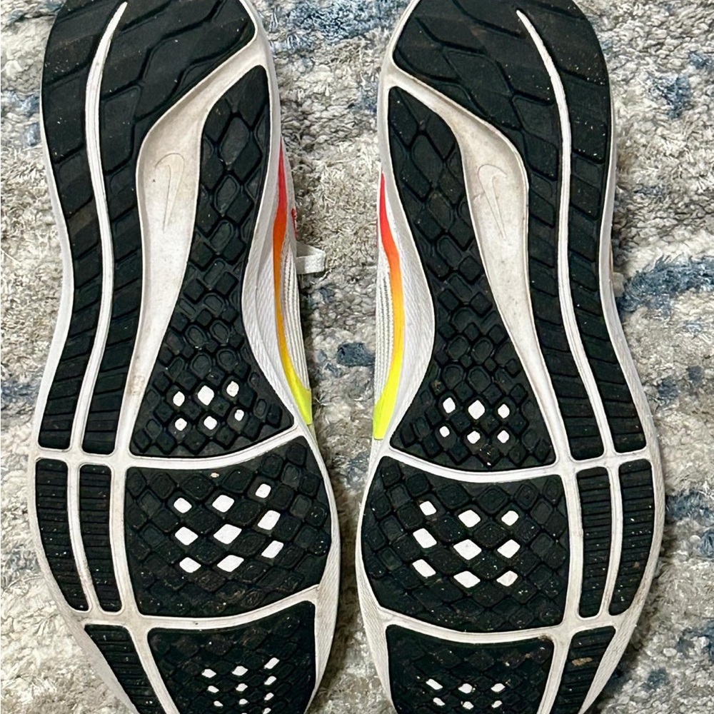 Nike Athletic Shoes with Black and Yellow Accents